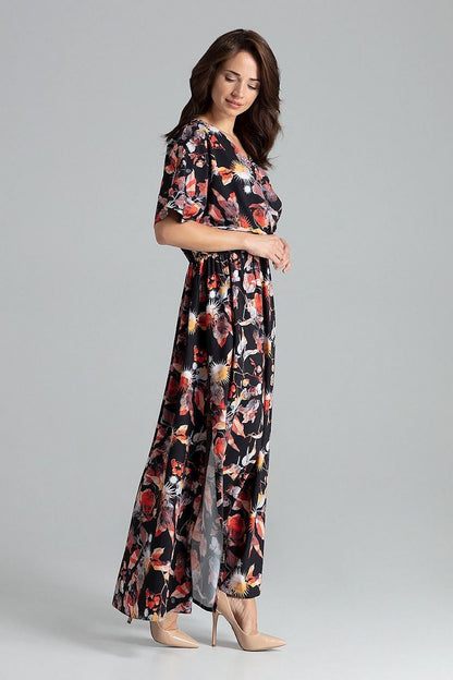 Luxurious Lenitif beige long dress displayed on a model, showcasing the kimono sleeves and side slits.