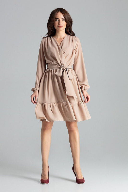 Close-up of the Elegant Beige Midi Dress with Long Sleeves, Ruffle Hem and Sash Tie by Lenitif, highlighting the elegant envelope neckline and luxurious fabric texture.