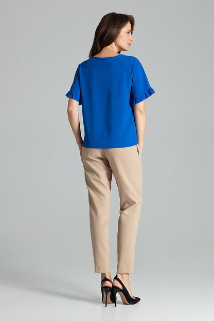 Model wearing Sapphire Lenitif Blouse with Frill Sleeves and Half-Round Neckline, exuding sophistication in women's fashion by Lenitif.