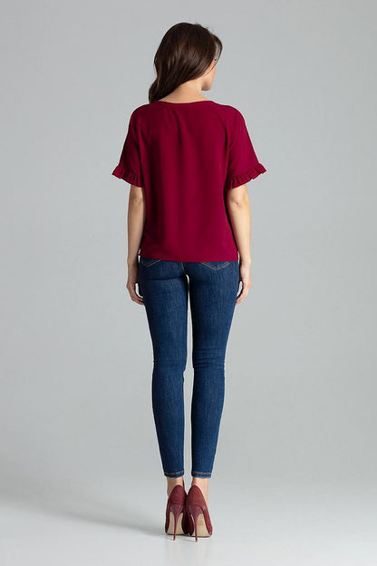 Close-up detail of the frill sleeves on the Sapphire Lenitif Blouse, highlighting the luxurious fabric and craftsmanship of Lenitif.