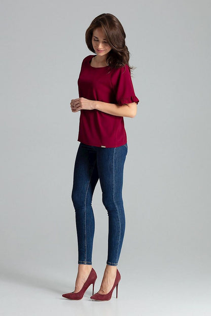 The Sapphire Lenitif Blouse with Half-Round Neckline elegantly displayed on a mannequin, emphasizing its chic design and quality by Lenitif.