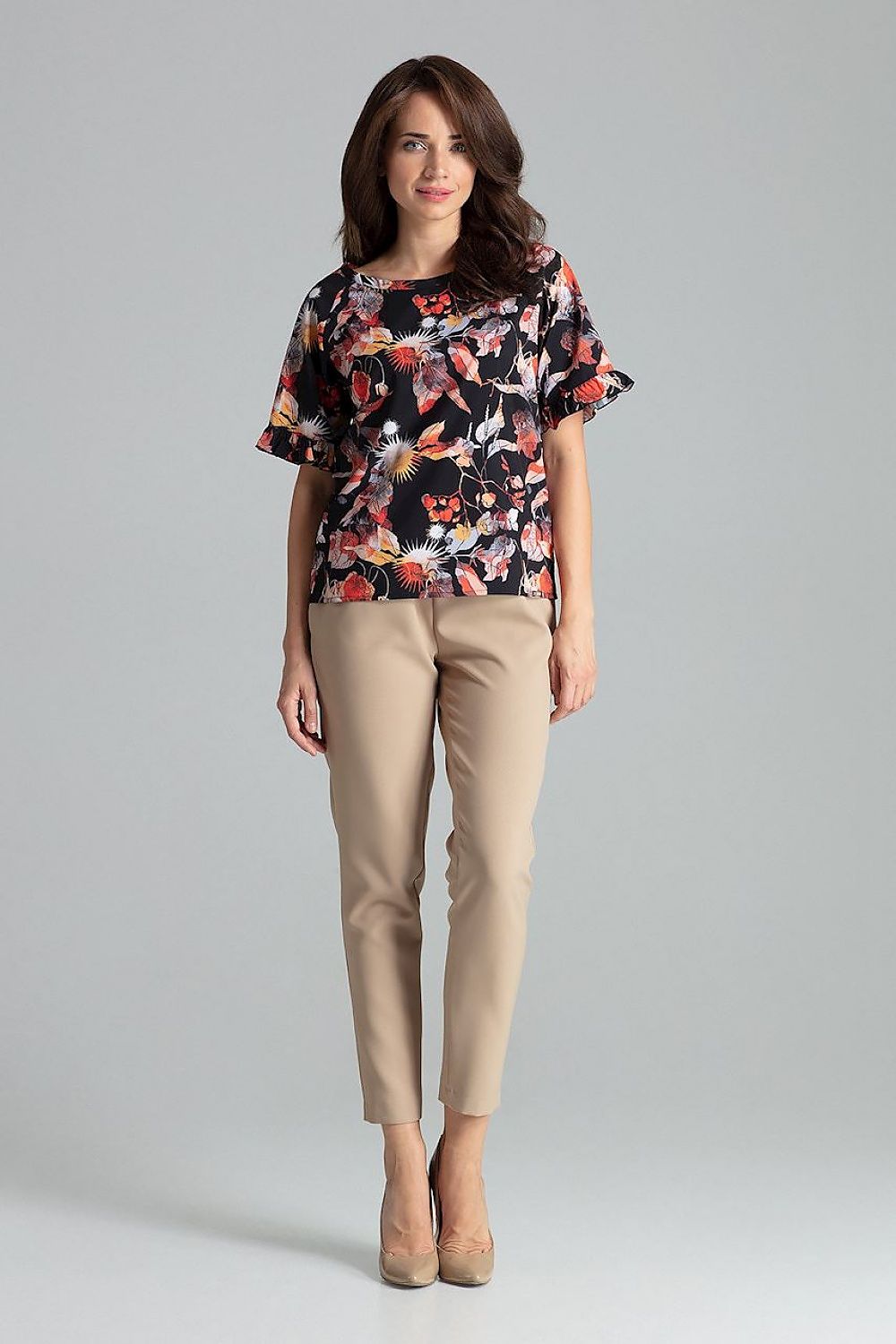 Model wearing Sapphire Lenitif Blouse with Frill Sleeves, exemplifying luxury and style for modern women by Lenitif.