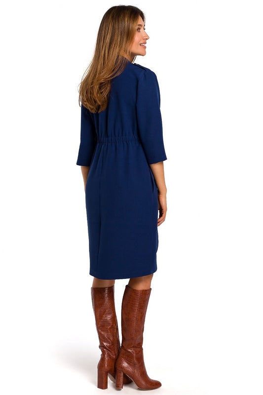 Stylove's Elegant Daydress showcasing its refined high collar and distinctive jacket cut, adorned with classy amber buttons, accentuating an upscale look.