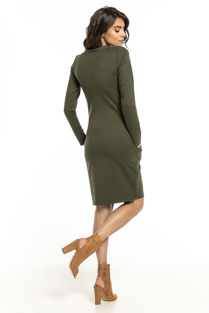 Back view of the Tessita cotton knit dress, showcasing its stylish design and convenient pockets for casual elegance.