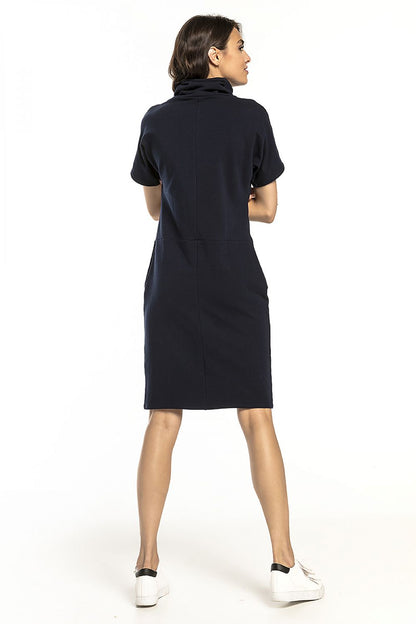Chic navy knitted sweatshirt dress with a turtleneck and short sleeves by Tessita, highlighted in a fashionable back view for a perfect casual look.