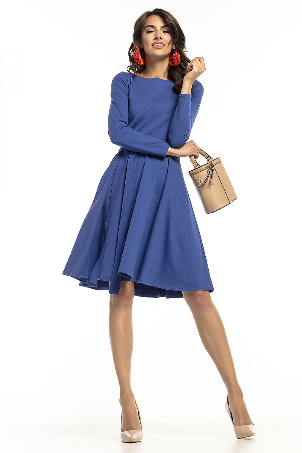 Elegant Tessita knit dress featuring long sleeves, a flared hem, and an attached belt, perfect for both work and social occasions.