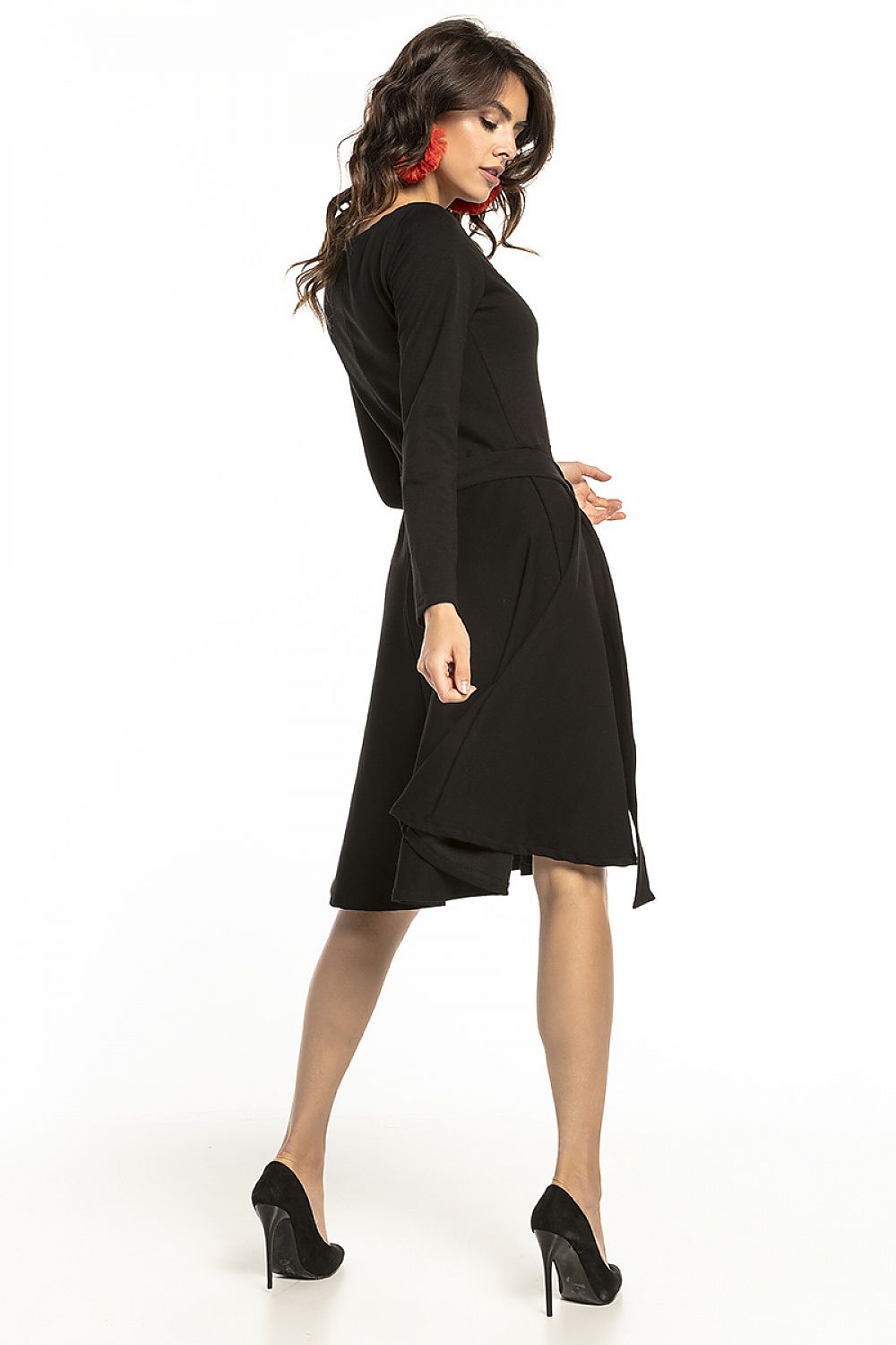 Elegant black knit dress from Tessita featuring long sleeves, a flared hem, and an attached belt, perfect for both work and casual outings.