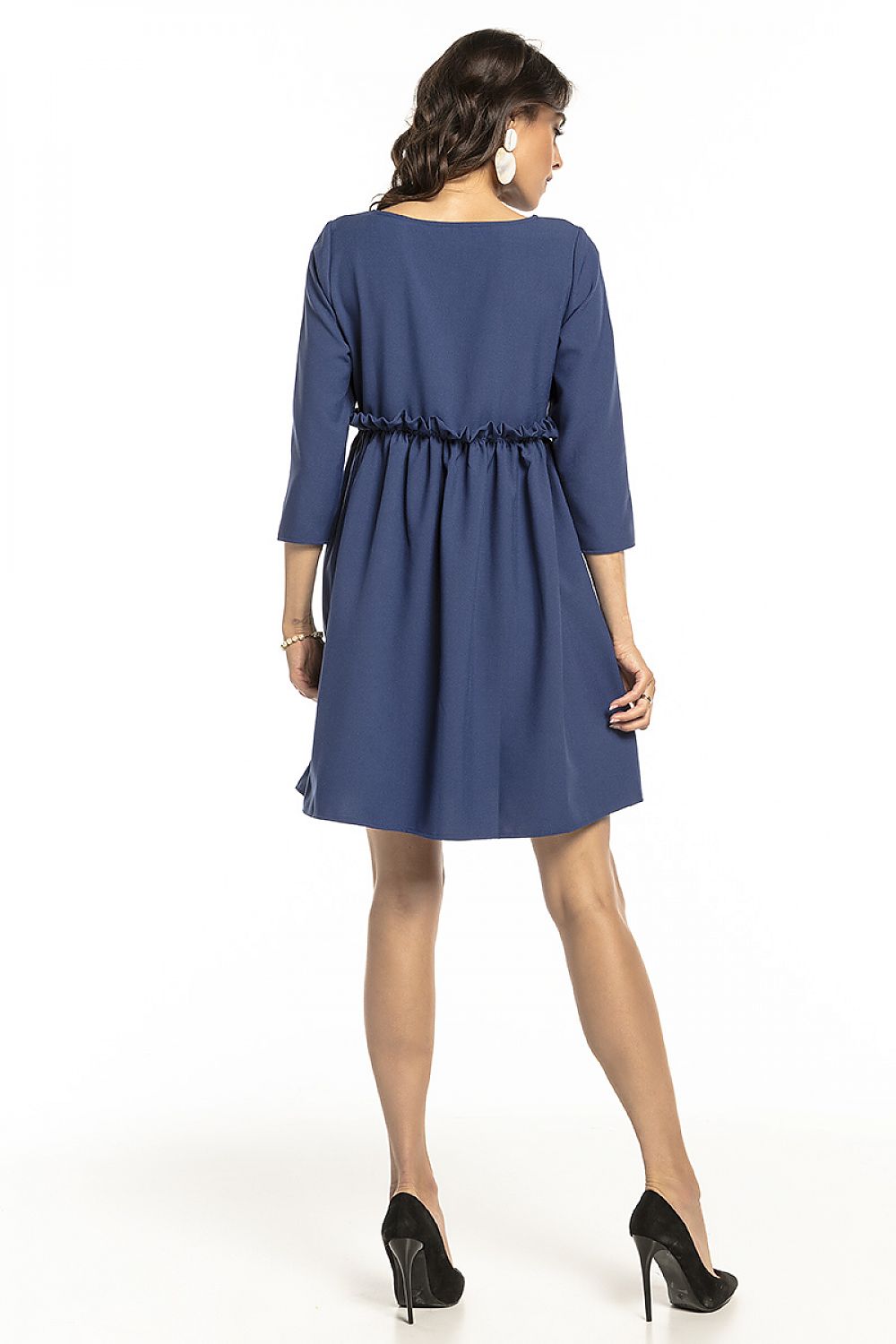 Back view of the Tessita navy blue daydress showcasing the frill detail at the waist, ideal for both casual and special occasions.