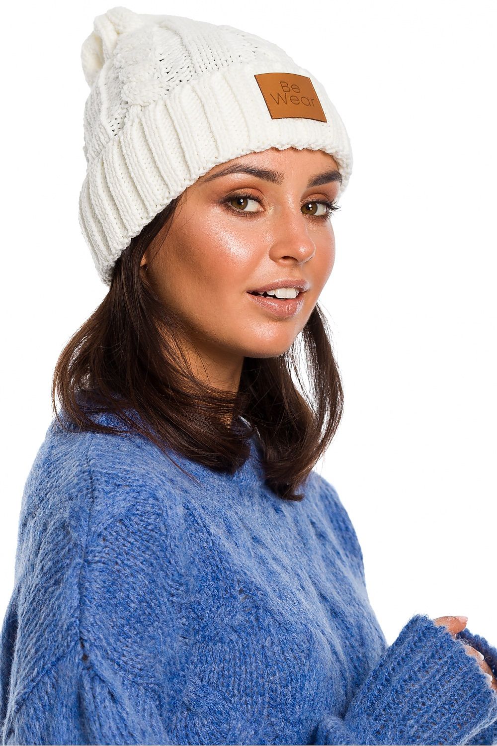 Luxurious BE Knit Plaid Beanie - A soft 100% acrylic hat with a flip-up bottom and logo patch, perfect for stylish winter wear.
