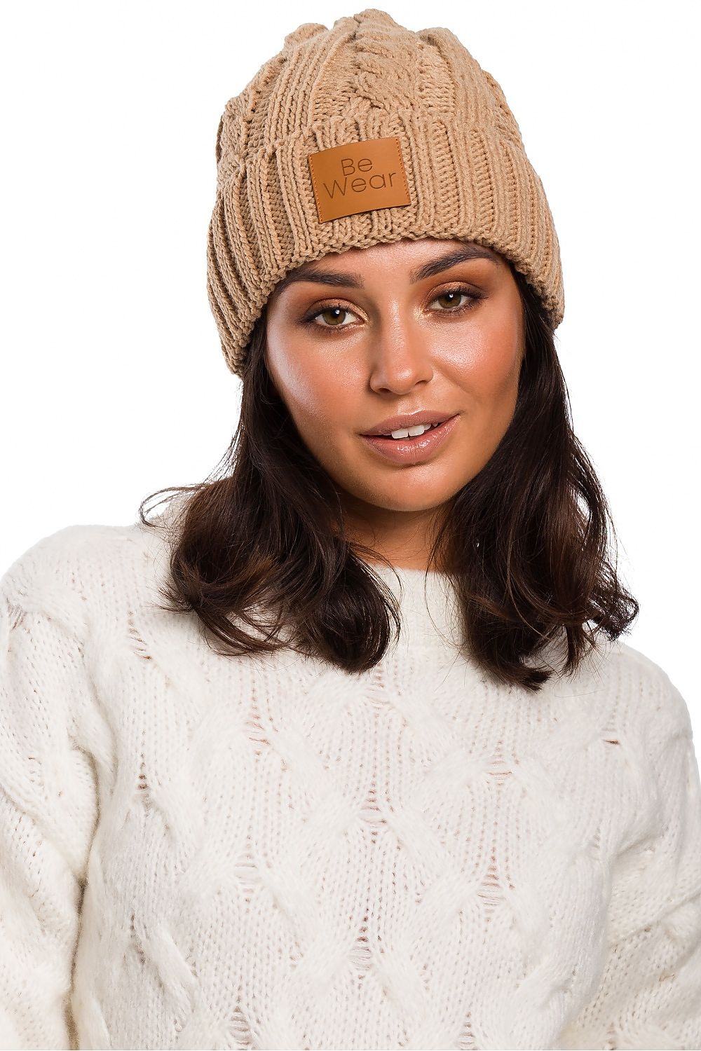 Luxurious BE Knit Plaid Beanie showcased in elegant design, featuring a comfortable flip-up bottom and crafted from soft 100% acrylic.