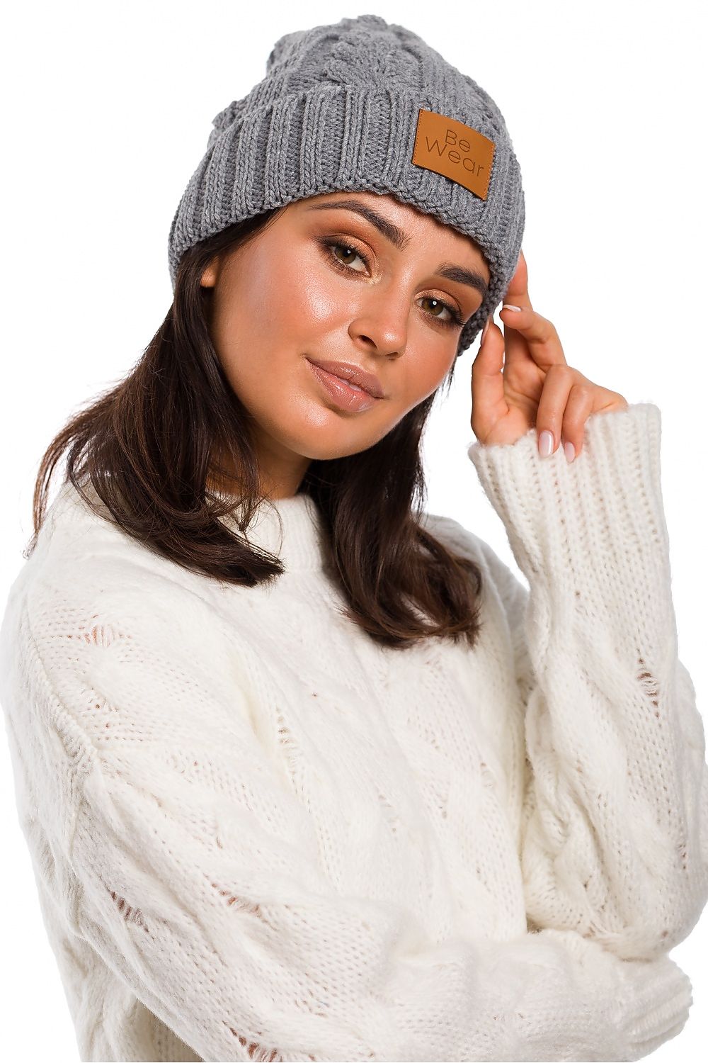 Luxurious BE Knit Plaid Beanie in soft acrylic with flip-up bottom and logo patch, stylish winter accessory.