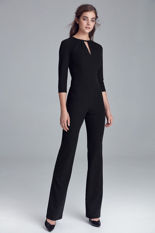 Elegant Fitted Jumpsuit by Nife, featuring 3/4 sleeves and a charming neckline, made from a soft viscose blend.
