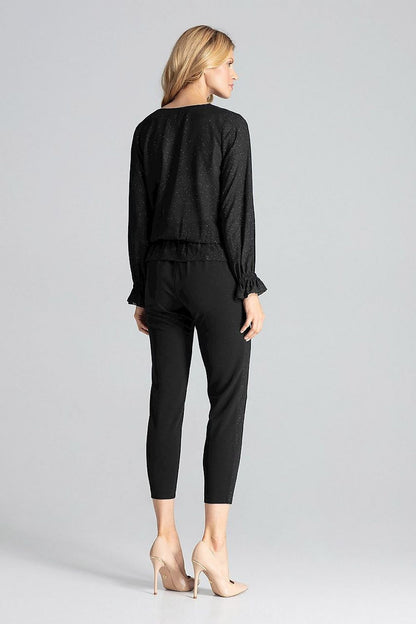 Close-up of Luxury Red Brocade Blouse by Figl, featuring delicate brocade fabric and an intriguing envelope neckline.