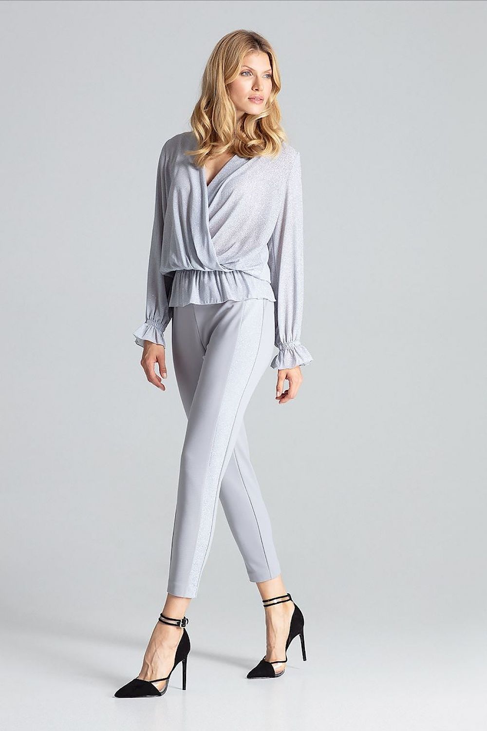 Detail of the elastic band at the waist of the Luxury Red Brocade Blouse by Figl, highlighting its stylish and flattering fit.