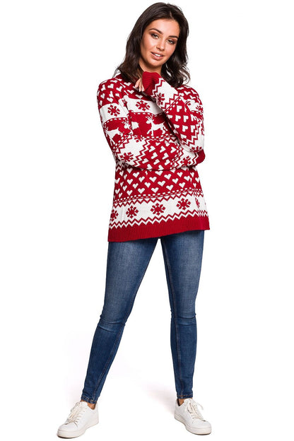 Luxurious BE Knit Christmas Reindeer Sweater displayed on a winter setting, embodying warmth and festive spirit for holiday gatherings.