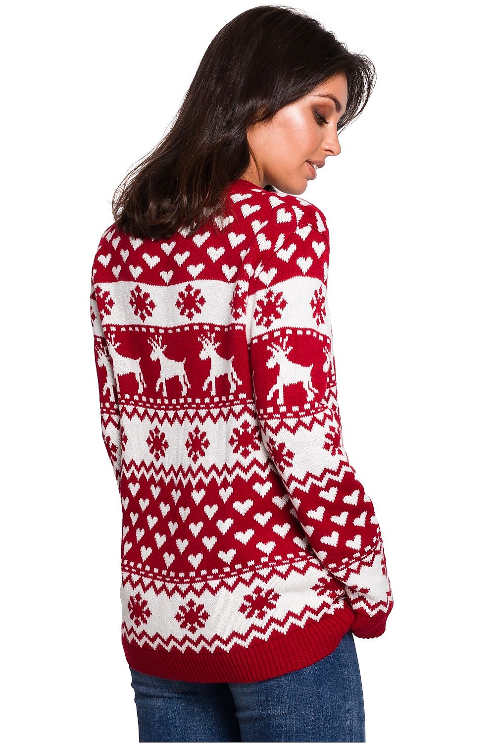 Luxurious BE Knit Christmas Reindeer Sweater in a cozy atmosphere, perfect for enjoying long winter evenings by the fireplace.
