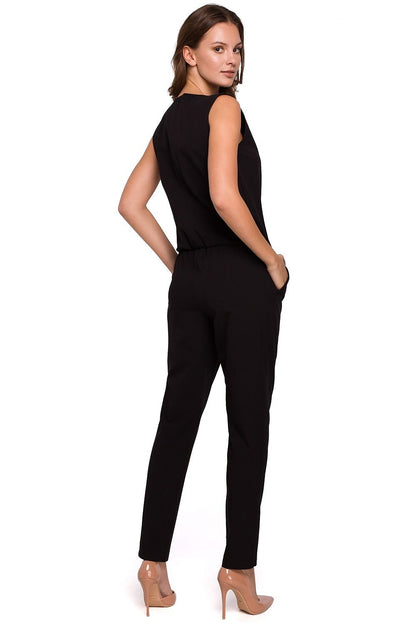 Chic elegant overalls with a modern silhouette, featuring a unique neckline and effortless style by Makover.