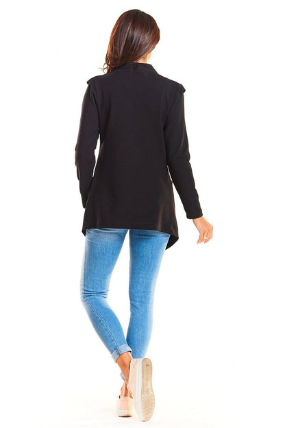 Elegant view of the Luxurious Infinite You Tracksuit Fabric Jacket showcasing its loose fit design, worn with denim leggings, highlighting comfort and sophistication.