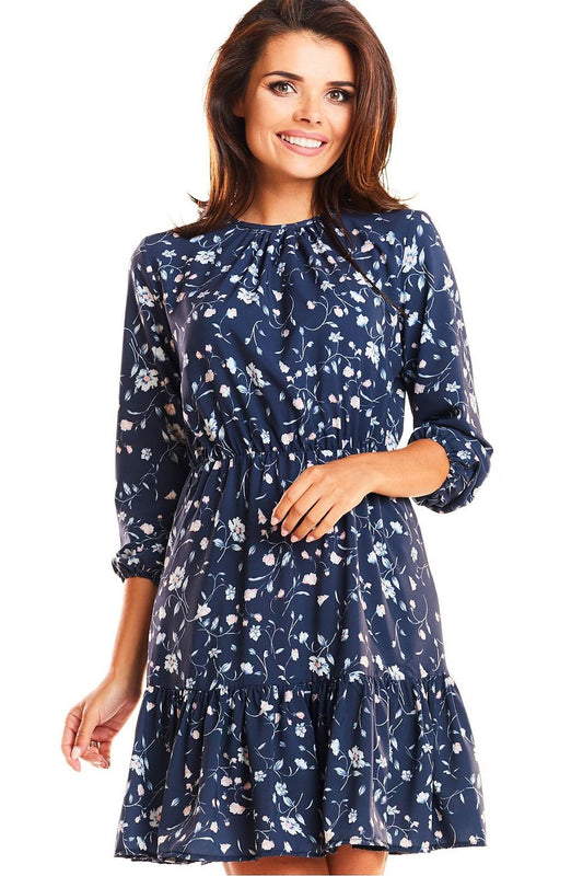 Elegant Infinite You Daydress with Elastic Waistband - a woman wearing a navy floral dress, showcasing a sophisticated design and comfortable fit, perfect for any occasion.