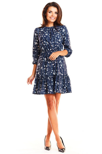Elegant Infinite You Daydress with Elastic Waistband - front view of a woman in a stylish navy floral dress, highlighting chic patterns and a flattering silhouette.