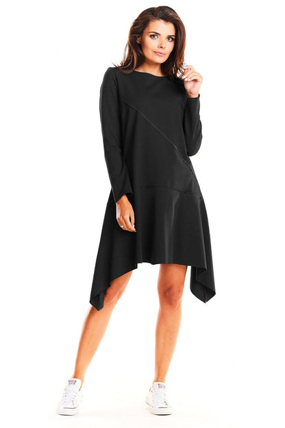Asymmetric Casual Daydress by Infinite You in classic black, elegantly worn by a model with a chic look, paired with stylish white sneakers.