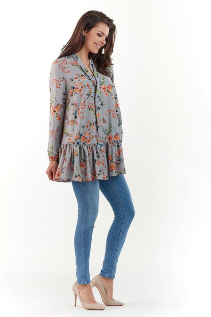 Sophisticated side view of the Elegant Long Sleeve Blouse by Infinite You, showcasing a beautifully crafted floral pattern and flattering silhouette, ideal for stylish occasions.