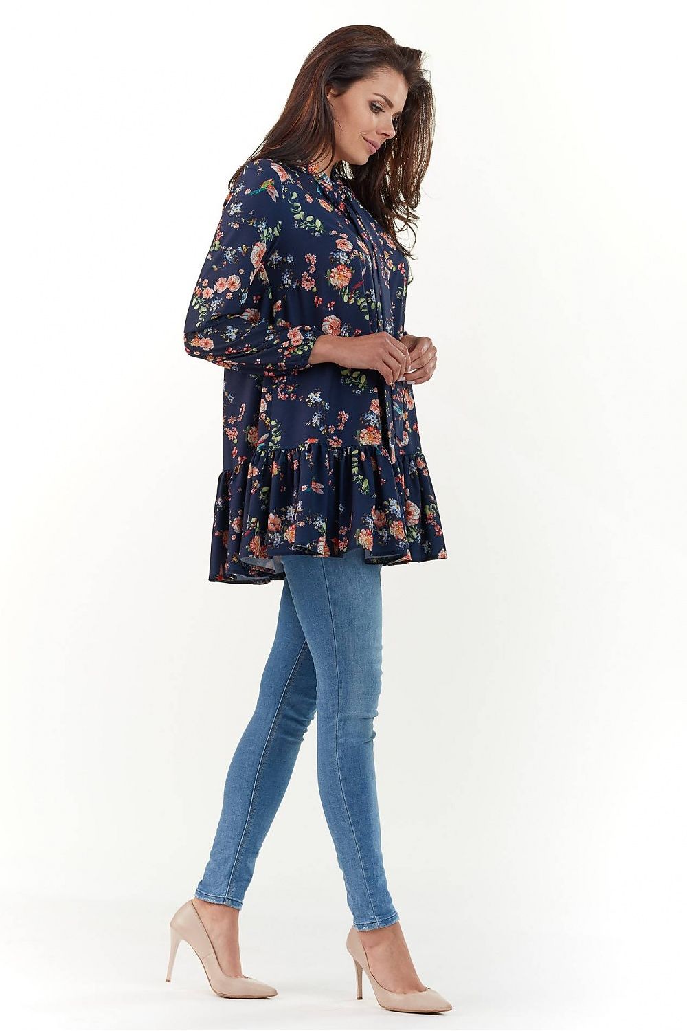 Elegant Long Sleeve Blouse by Infinite You showcased from the side, displaying its luxurious floral pattern and flattering silhouette paired with fitted jeans.
