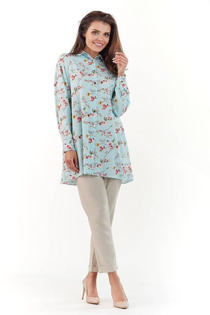 Model wearing the Elegant Long Sleeve Shirt with Charming Crease in a stunning blue variant, featuring beautiful patterns, great for an elegant wardrobe.