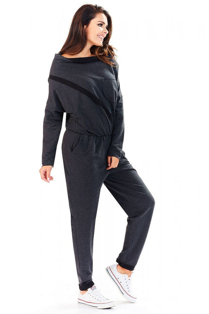 Side view of the Elegant Loose-Fitting Tracksuit With Boat Neckline by Infinite You, highlighting its sophisticated boat neckline and relaxed fit, worn by a model in dark grey.