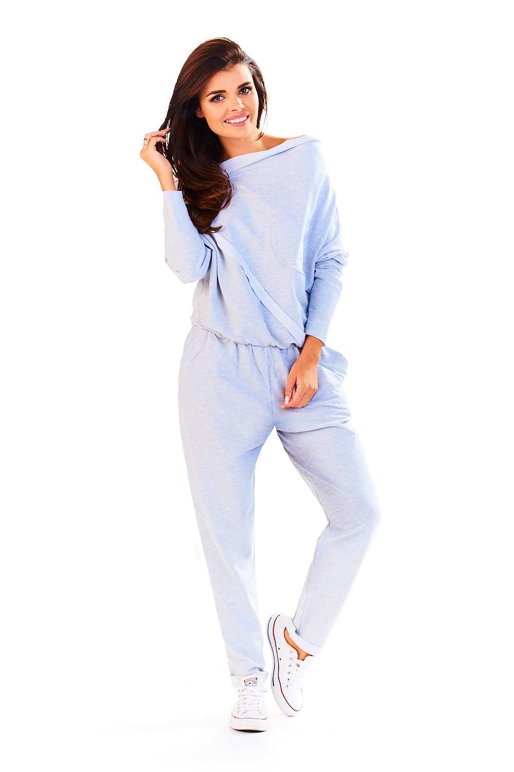 Model showcasing the Elegant Loose-Fitting Tracksuit With Boat Neckline by Infinite You in a light blue shade, emphasising comfort and elegance in a luxurious cotton-spandex blend.