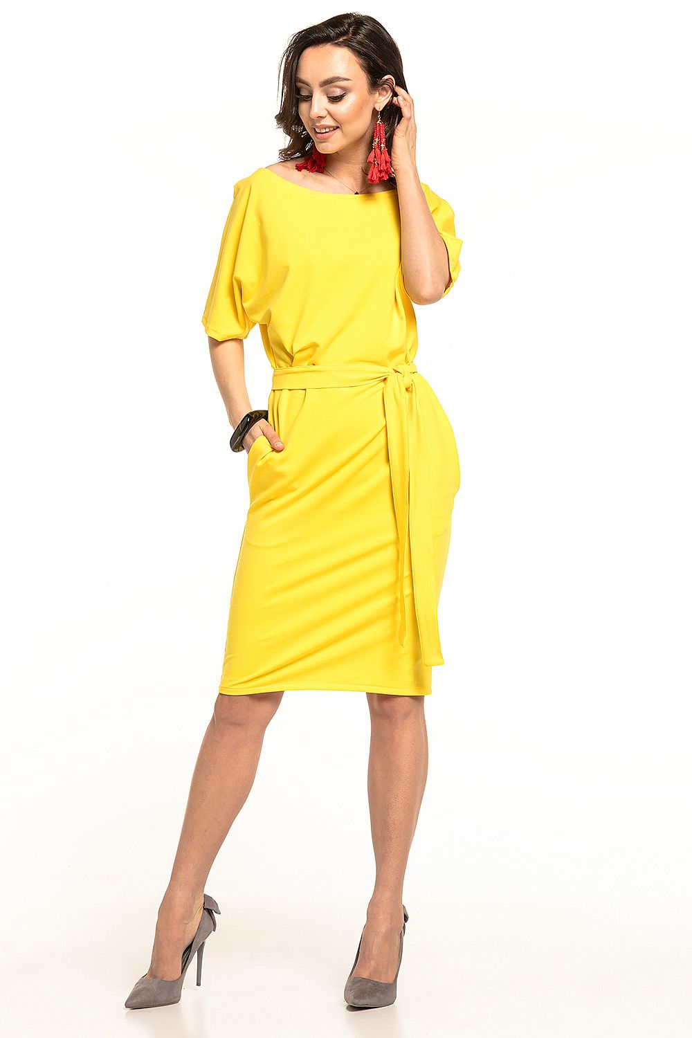 Elegant yellow midi dress by Tessita featuring kimono sleeves, a belted waist, and a pencil cut, styled for a polished look.