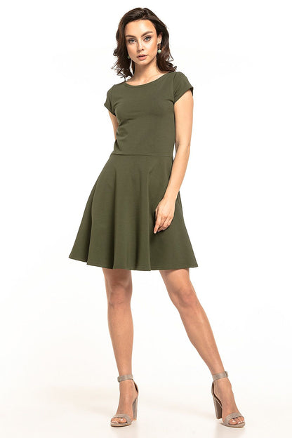 Tessita cosy cotton midi dress in olive green, featuring a sophisticated boat neckline and stylish flared design.
