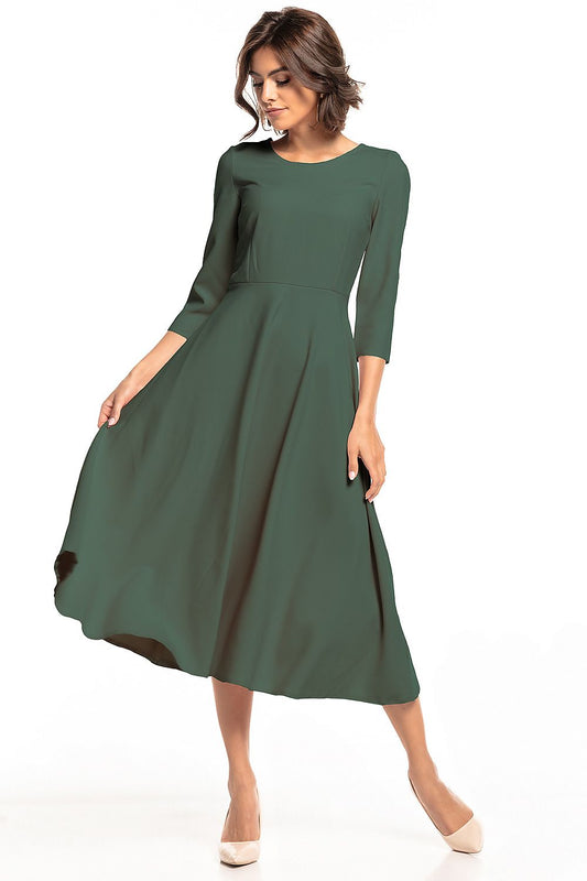 Elegant Tessita lightweight maxi dress showcasing a graceful fit, perfect for versatile occasions. The dress features a covered zipper and a flowing silhouette, accentuating feminine charm.