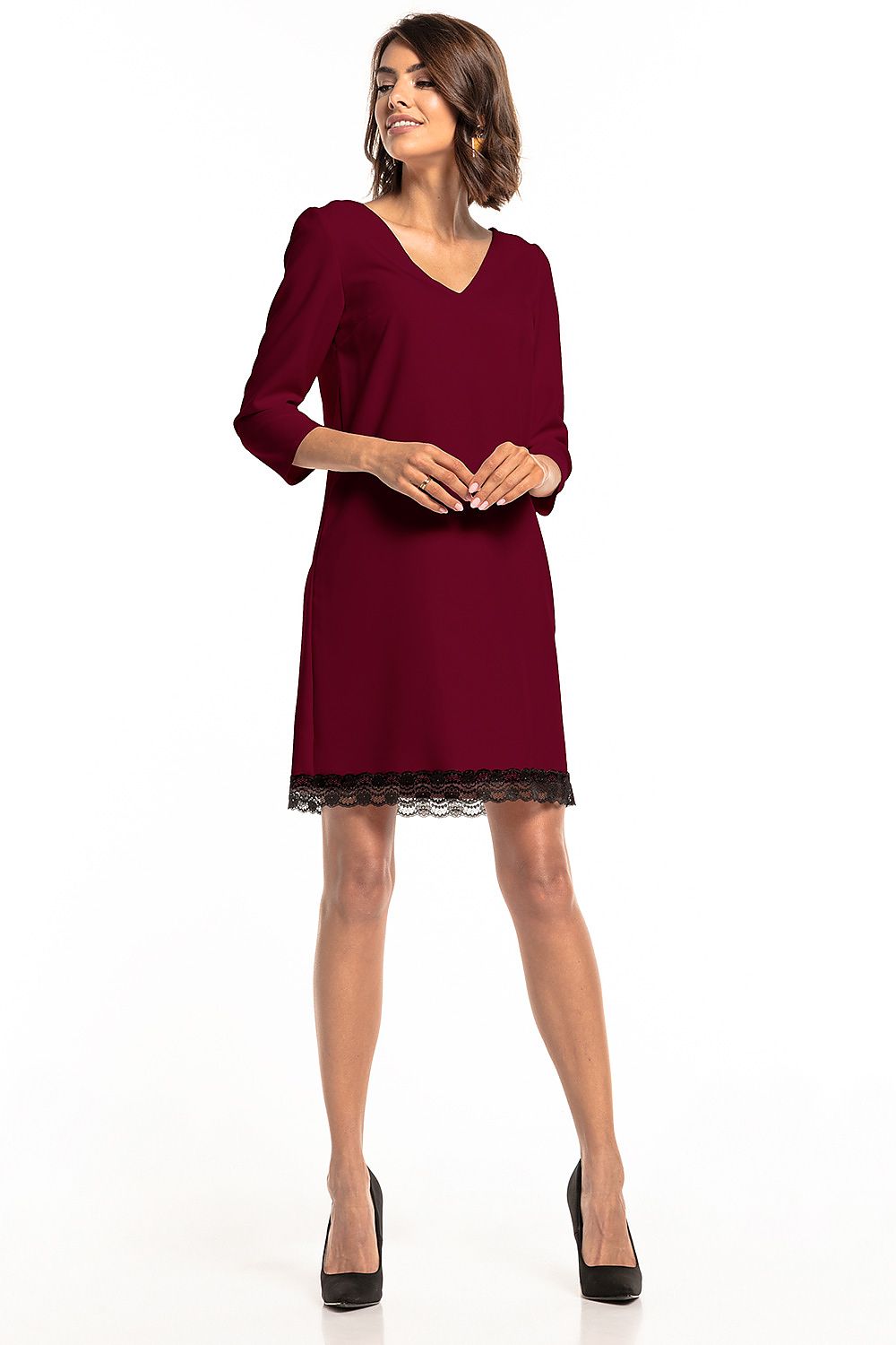 Stylish model wearing the Tessita Elegant Heart Neckline Lace Trim Daydress, exuding elegance and grace in upscale settings.