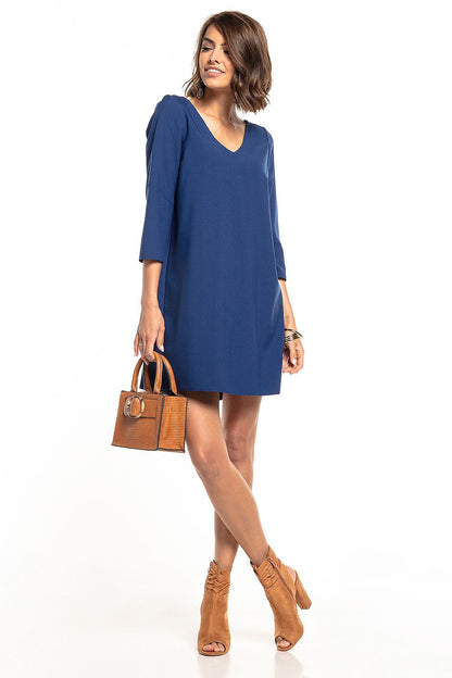 Multiple size options of the exquisite Tessita daydress with sweetheart neckline displayed on a stylish rack.