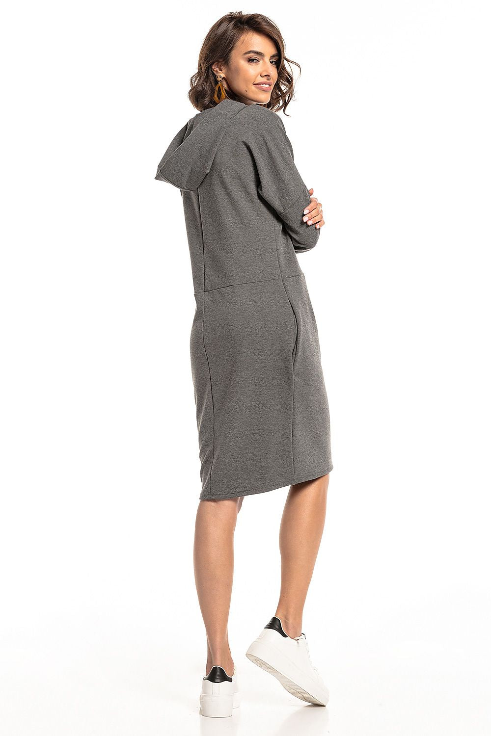 Trendy Tessita Knit Hooded Dress with unique slashes and practical seam pockets, ideal for fashionable everyday elegance.