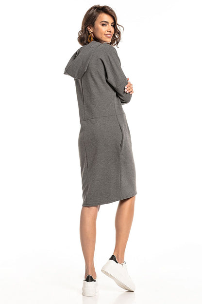 Trendy Tessita Knit Hooded Dress with unique slashes and practical seam pockets, ideal for fashionable everyday elegance.