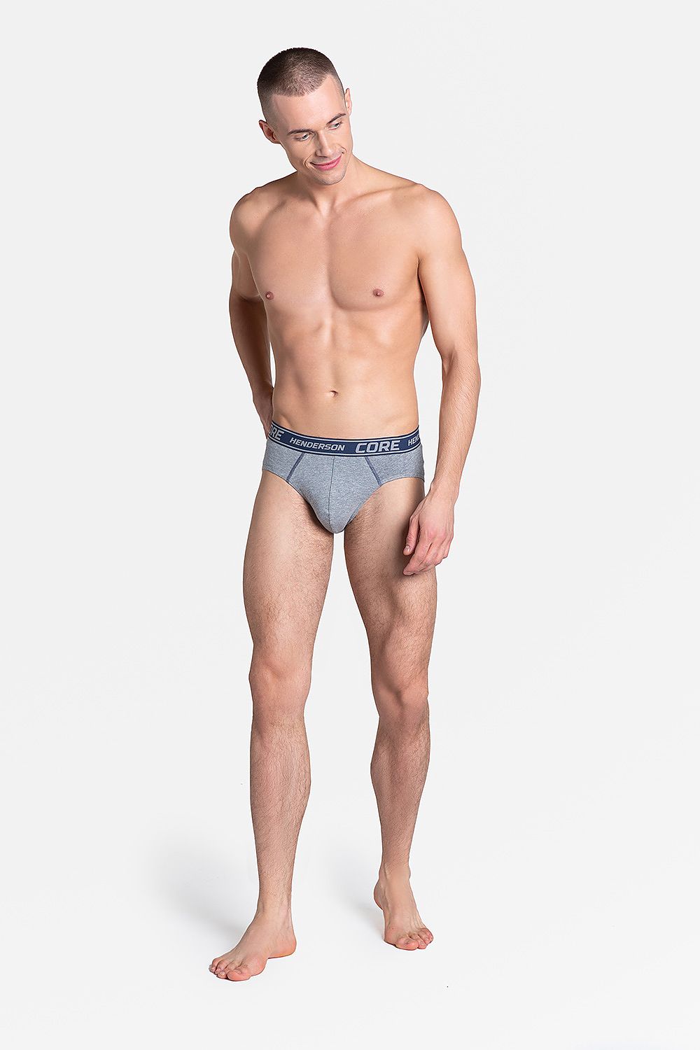 A model wearing luxury Henderson men's cotton briefs in grey, from the 2 Pack Grey & Navy Blue collection, highlighting a classic comfortable design.