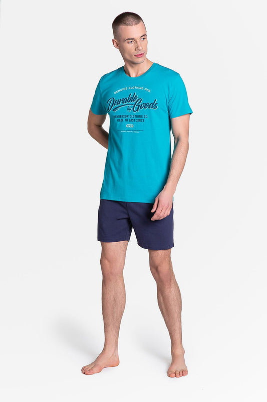 Luxury Henderson Sporty Style Pyjamas Set featuring a vibrant turquoise T-shirt with 'Durable by Goods' print and dark knee-length shorts. Ideal for comfort and style.