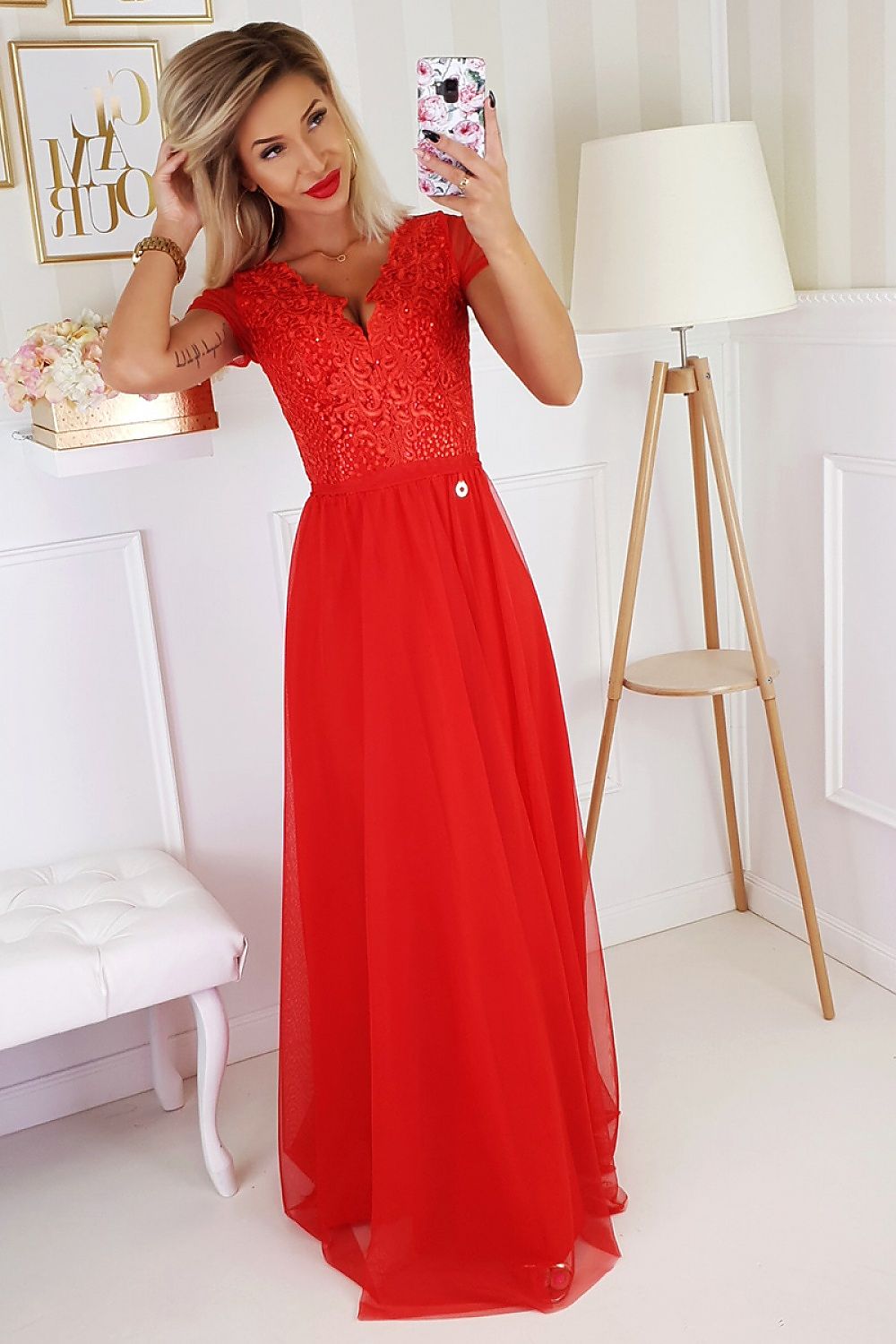 Stunning long red dress by Bicotone featuring an elegant heart neckline and intricate lace detail, perfect for special occasions.