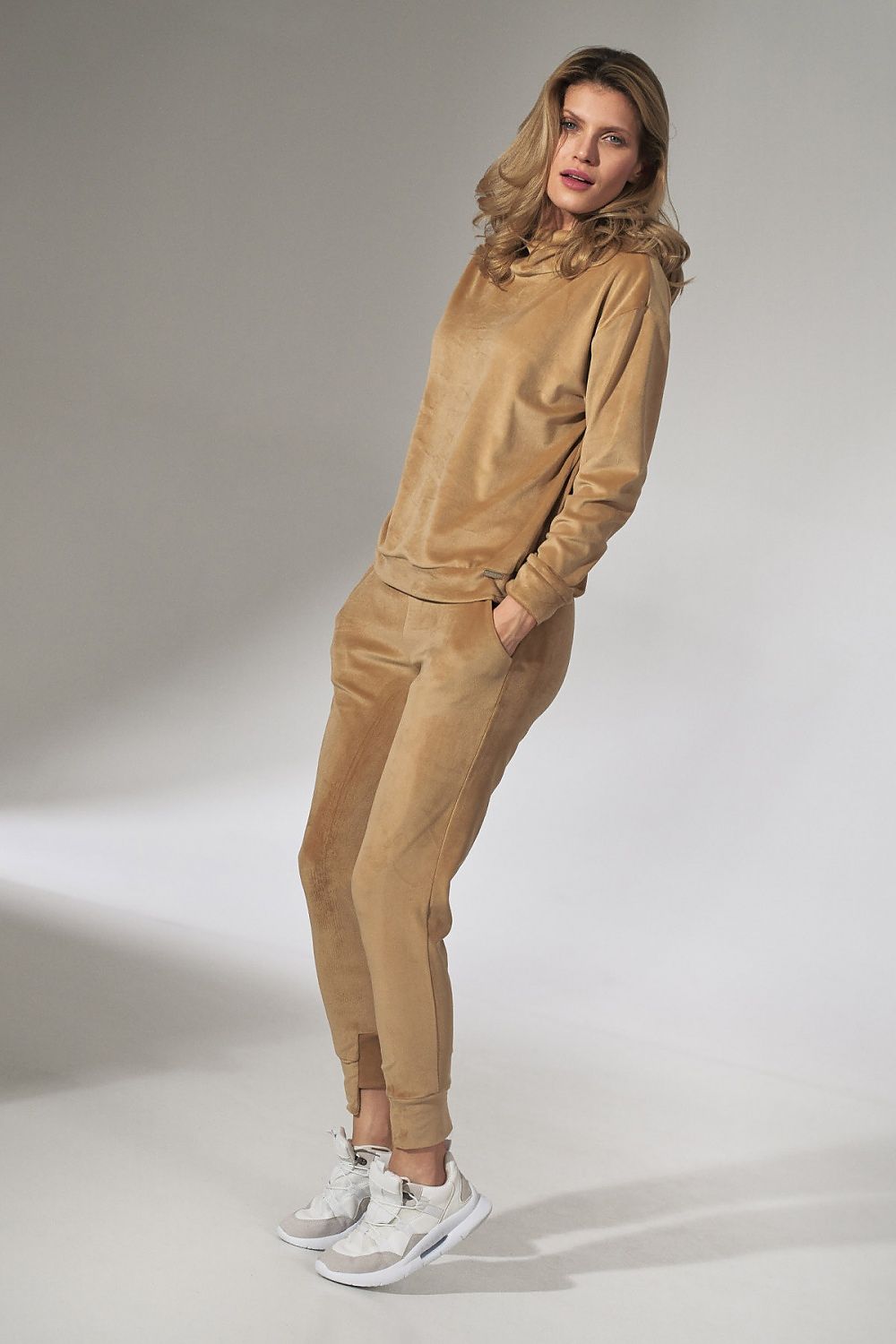 Luxury Figl Pink Velour Tracksuit Trousers with Tapered Legs and Drawstring Waist, styled with a matching top, showcasing elegance and comfort.