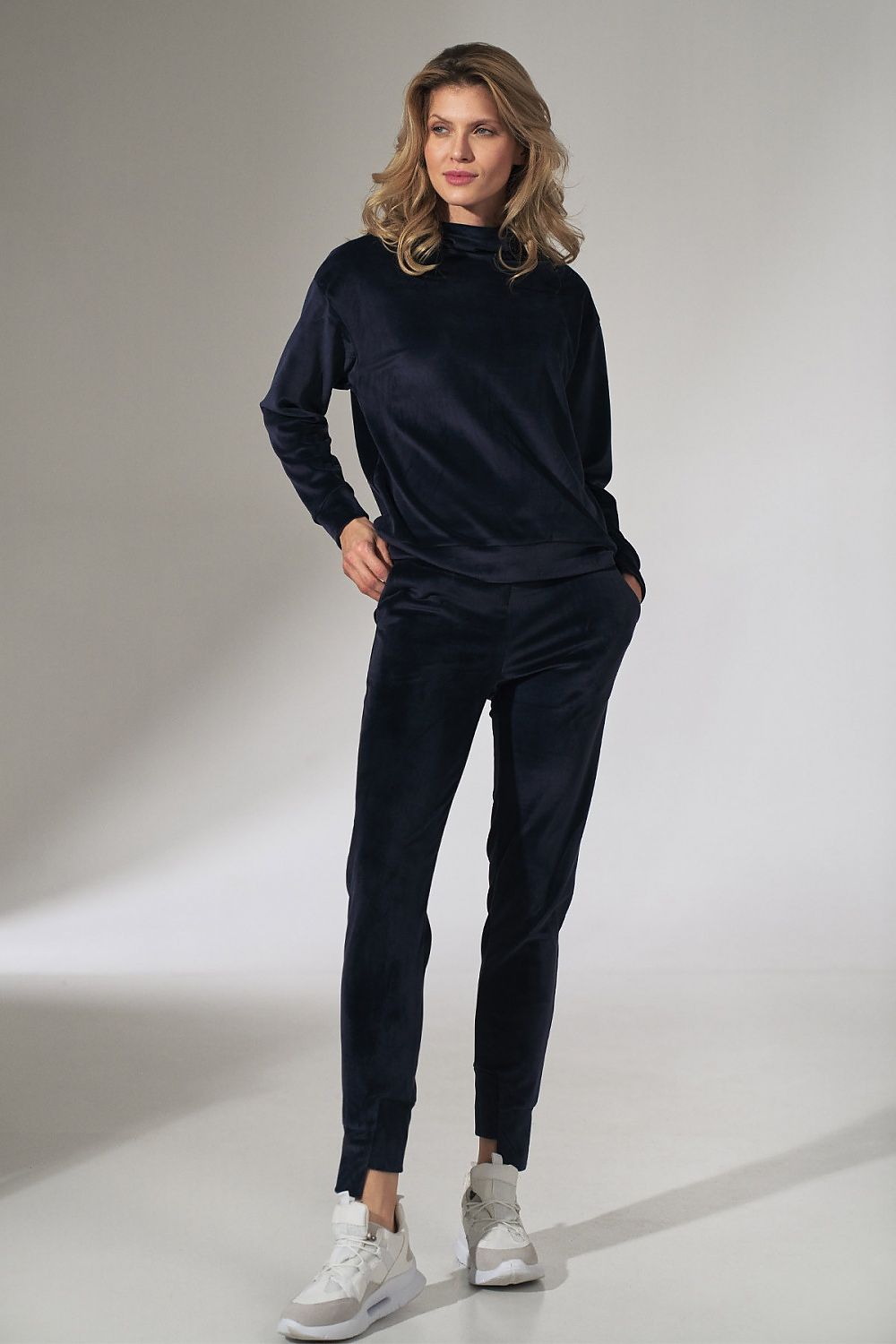 Elegant Figl Pink Velour Tracksuit Trousers with Tapered Legs and Drawstring Waist, demonstrated in a refined ensemble, perfect for casual luxury.