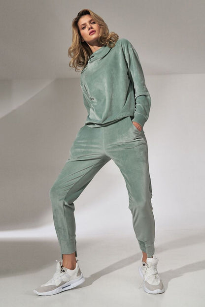Elegant Figl Pink Velour Tracksuit Trousers with Tapered Legs and Drawstring Waist in a soothing green shade, exuding comfort and style.