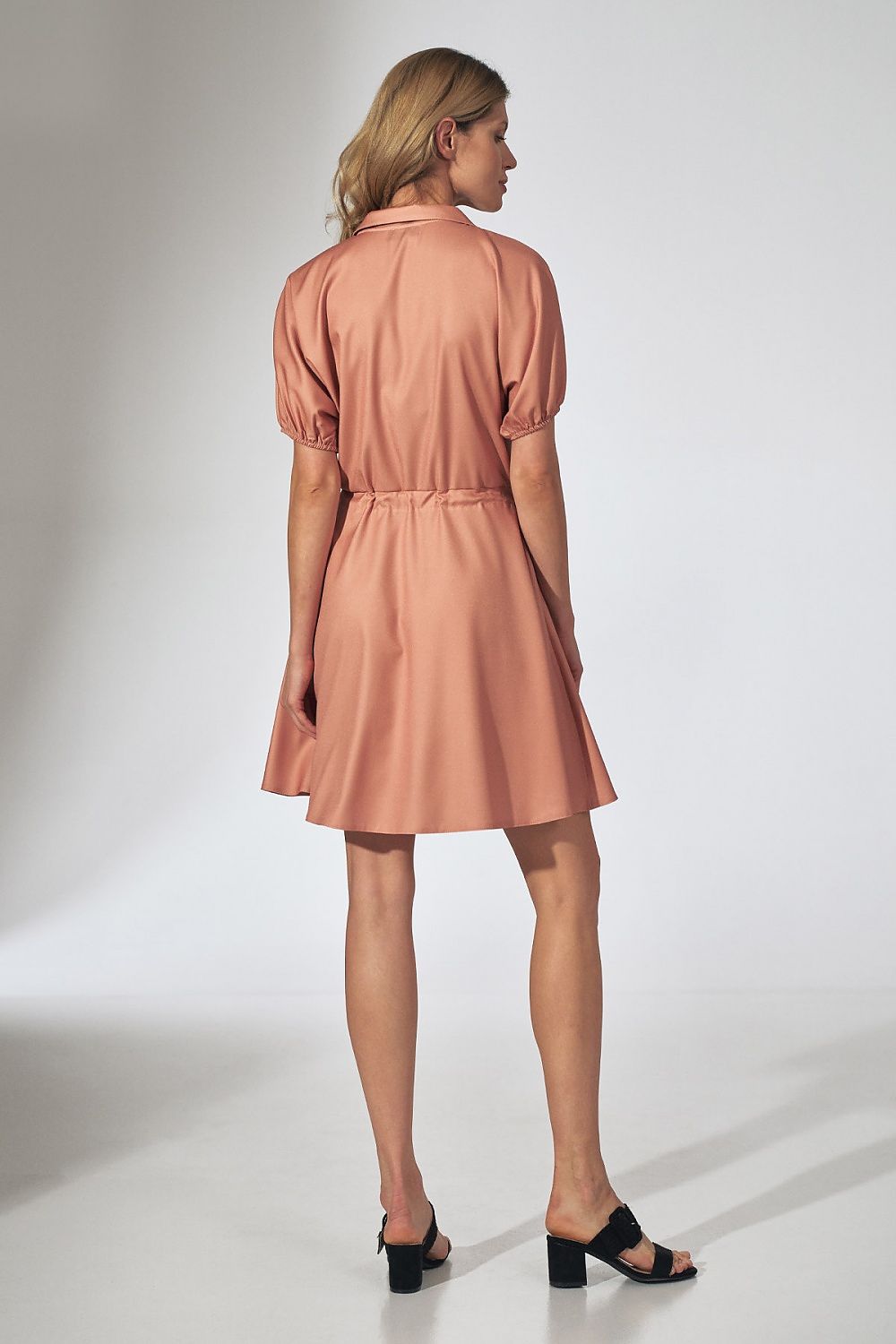 Elegant Orange Kimono Mini Dress with Collar, Flared Bottom and Side Pockets by Figl, photographed from the back to display the exquisite finishing and waist detail.