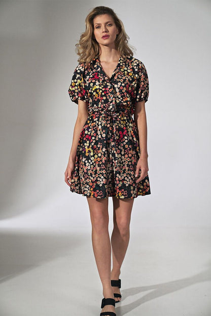 Floral pattern Kimono Mini Dress by Figl, featuring a model elegantly dressed with puff sleeves and an attractive belted waist, set in a sophisticated studio environment.