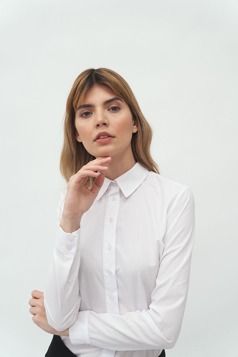 Elegant Long Sleeve Cotton Blend Shirt by Nife - Classic Fit with Two-Button Sleeves worn by a model, showcasing a sophisticated look against a minimalist backdrop.