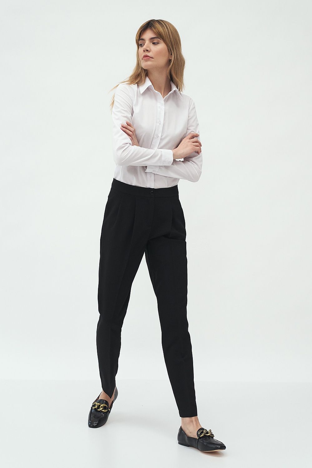 Elegant Long Sleeve Cotton Blend Shirt by Nife - Classic Fit with Two-Button Sleeves paired with sleek pants, epitomising timeless sophistication and chic style.