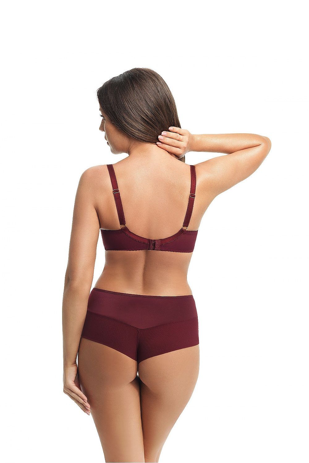 Back view of Gorsenia Luxe Brazilian Style Maroon Panties with Lace Detailing, featuring a smooth satin finish and delicate lace, worn by a model.