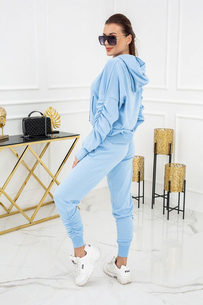 Back perspective of the Luxurious Vittoria Ventini 2-Piece Knitted Tracksuit Set in blue, highlighting its modern design and comfortable fit, crafted for luxury attire.