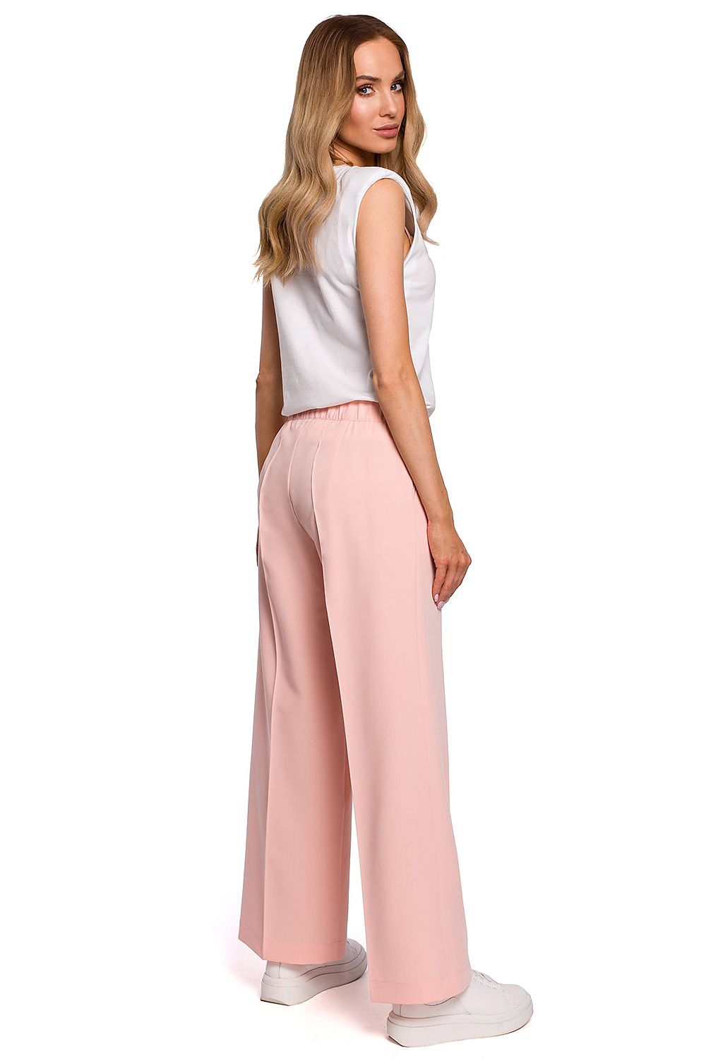 Back view of the Elegant Wide Leg Trousers with Pleats and Elastic Waistband by Moe, highlighting the relaxed fit and luxurious fabric, ideal for sophisticated casual wear.